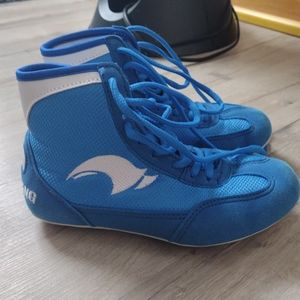 Boy wrestling shoes